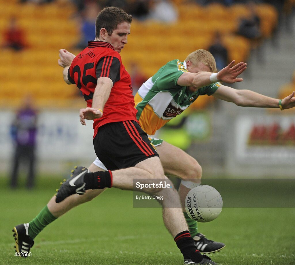17 July 2010; Aidan Carr, Down, shoots to score his side's first goal despite the efforts of Niall Darby, Offaly. GAA Football All-Ireland Senior Championship Qualifier Round 3, Down v Offaly, O'Connor Park, Tullamore, Co. Offaly. Picture credit: Barry Cregg / SPORTSFILE