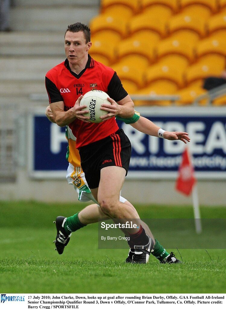 17 July 2010; John Clarke, Down, looks up at goal after rounding Brian Darby, Offaly. GAA Football All-Ireland Senior Championship Qualifier Round 3, Down v Offaly, O'Connor Park, Tullamore, Co. Offaly. Picture credit: Barry Cregg / SPORTSFILE