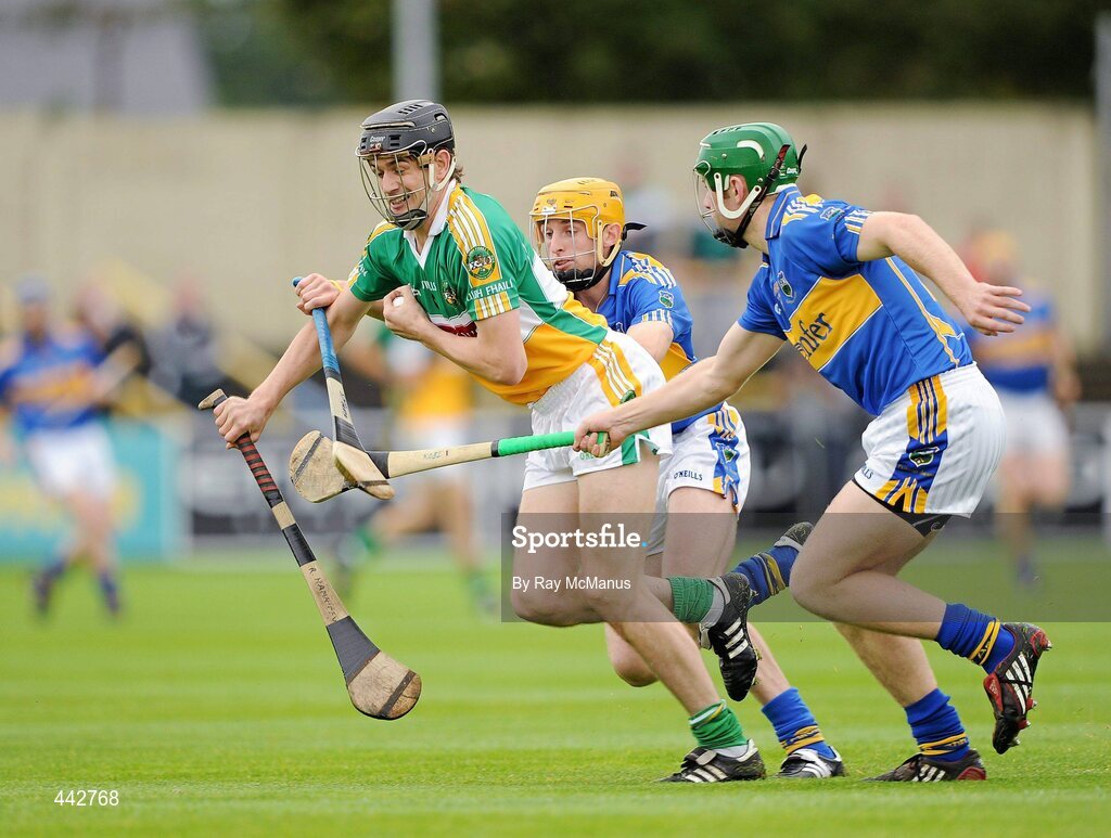 18 July 2010; Rory Hanniffy, Offaly, in action against Shane McGrath and Noel McGrath, Tipperary. GAA Hurling All-Ireland Senior Championship Phase 3, Tipperary v Offaly, O'Moore Park, Portlaoise, Co. Laois. Picture credit: Ray McManus / SPORTSFILE