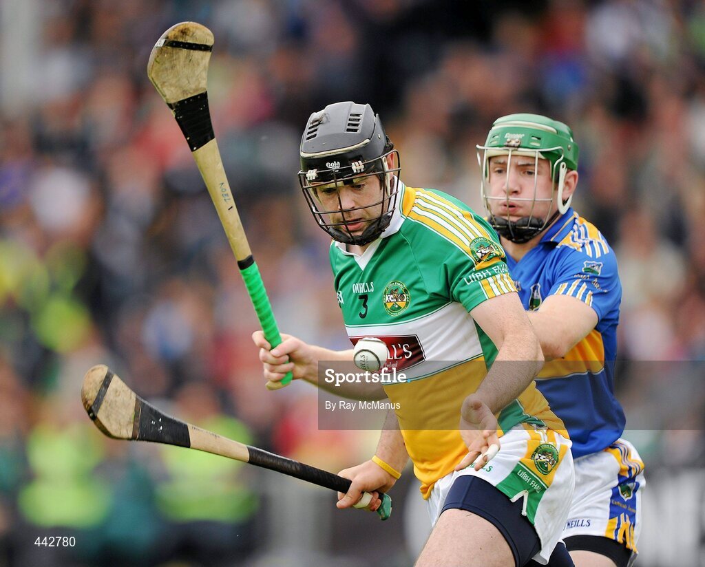 18 July 2010; Paul Cleary, Offaly, in action against Noel McGrath, Tipperary. GAA Hurling All-Ireland Senior Championship Phase 3, Tipperary v Offaly, O'Moore Park, Portlaoise, Co. Laois. Picture credit: Ray McManus / SPORTSFILE
