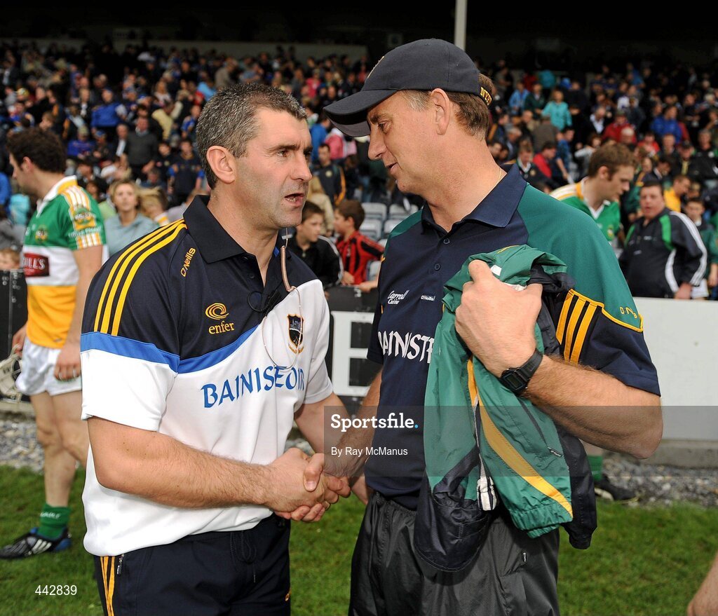 18 July 2010; The Tipperary manager, Liam Sheedy, and Offally manager, Joe Dooley, shake hands after the game. GAA Hurling All-Ireland Senior Championship Phase 3, Tipperary v Offaly, O'Moore Park, Portlaoise, Co. Laois. Picture credit: Ray McManus / SPORTSFILE