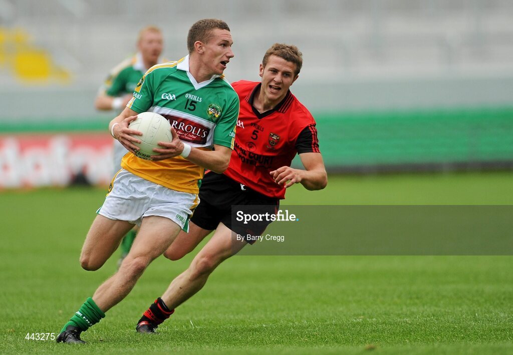 17 July 2010; Anton Sullivan, Offaly in action against Darren O' Hagan. GAA Football All-Ireland Senior Championship Qualifier Round 3, Down v Offaly, O'Connor Park, Tullamore, Co. Offaly. Picture credit: Barry Cregg / SPORTSFILE