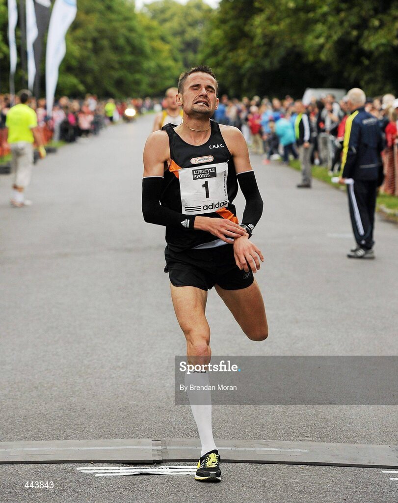 17 July 2010; Sergiu Ciobanu, Clonliffe Harriers AC, comes home in third place during the Lifestyle Sports - adidas Irish Runner 5 Mile Race. The Phoenix Park, Dublin. Picture credit: Brendan Moran / SPORTSFILE