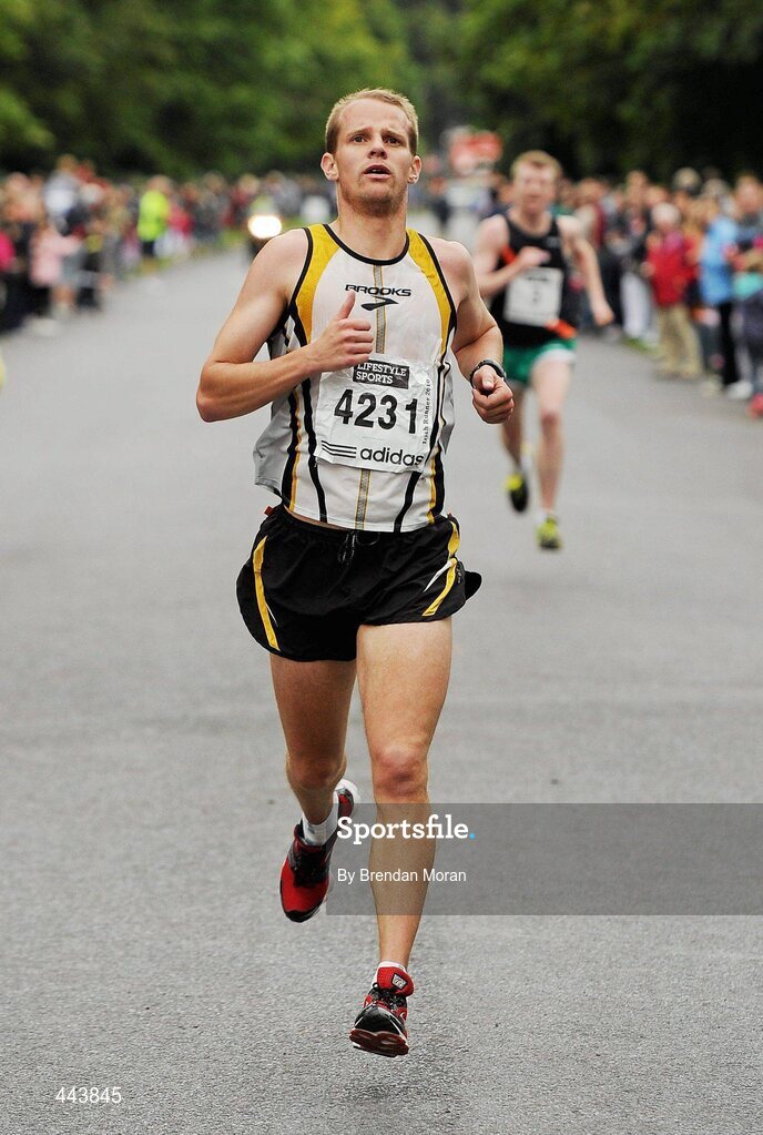 17 July 2010; Joe McAllister comes home in fourth place during the Lifestyle Sports - adidas Irish Runner 5 Mile Race. The Phoenix Park, Dublin. Picture credit: Brendan Moran / SPORTSFILE