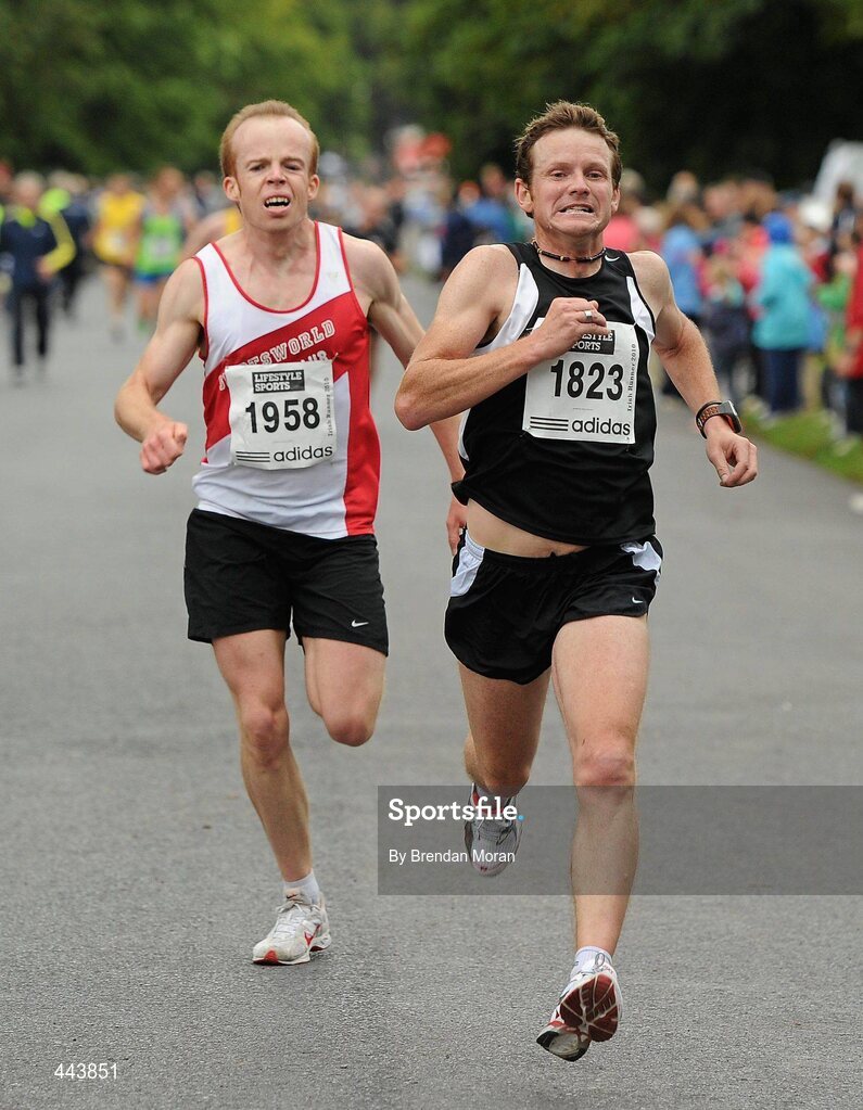 17 July 2010; David Byrne, 1823, Tallaght AC, Dublin, beats Gareth Murran, 1958, Sportsworld Running Club, Dublin, down the home straight during the Lifestyle Sports - adidas Irish Runner 5 Mile Race. The Phoenix Park, Dublin. Picture credit: Brendan Moran / SPORTSFILE