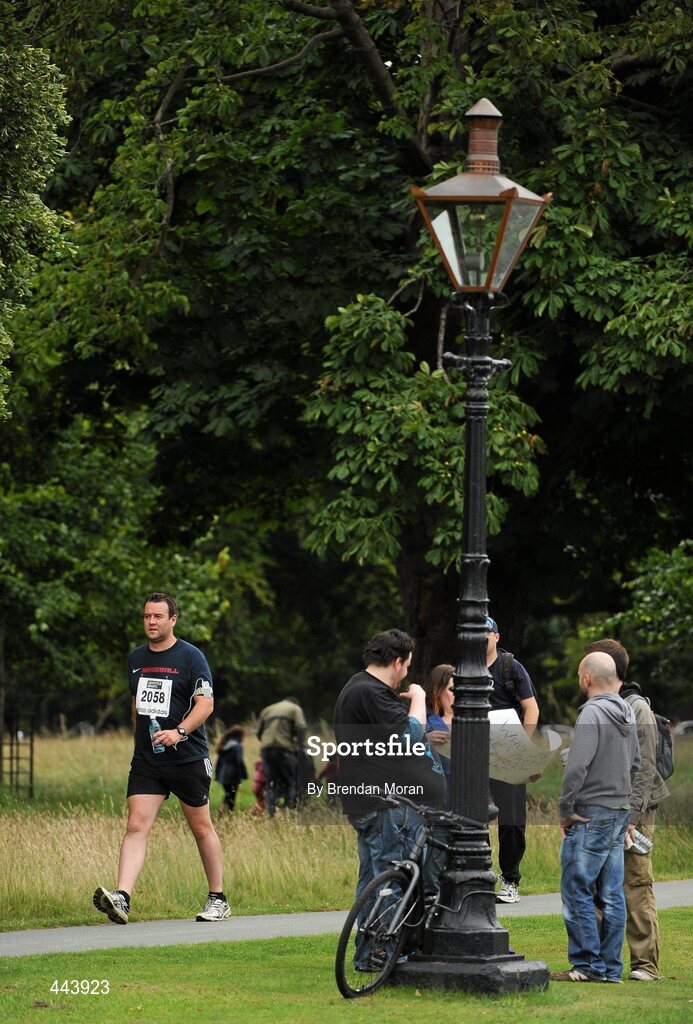 17 July 2010; Competitor Hugh Fitzmaurice, from Greystones, Co. Wicklow, makes his way to the start ahead of the Lifestyle Sports - adidas Irish Runner 5 Mile Race. The Phoenix Park, Dublin. Picture credit: Brendan Moran / SPORTSFILE