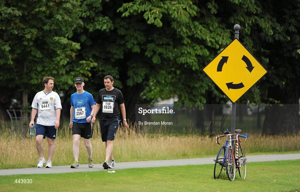 17 July 2010; Competitors Donal Murphy, 9441, Aaron Sullivan, 2367 and Evan Lloyd, 6828, all from Dublin, make their way to the start ahead of the Lifestyle Sports - adidas Irish Runner 5 Mile Race. The Phoenix Park, Dublin. Picture credit: Brendan Moran / SPORTSFILE