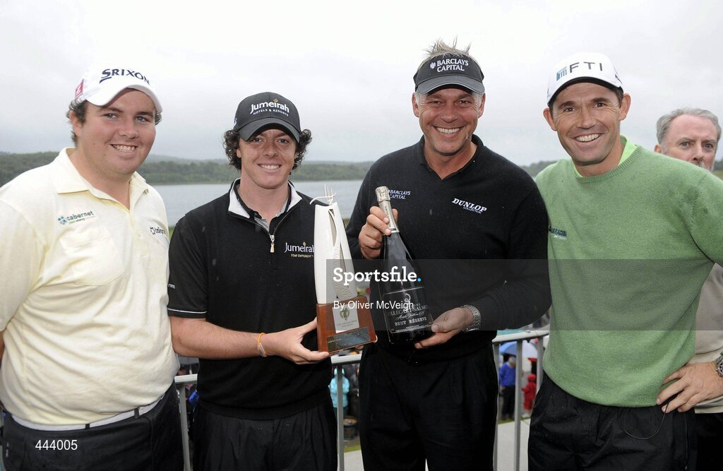 21 July 2010; Golfers Rory McIlroy and Darren Clarke celebrate with the trophy alongside Shane Lowry, left, and Padraig Harrington, right, after the 2010 Lough Erne Challenge. Lough Erne Resort, Enniskillen, Co. Fermanagh. Picture credit: Oliver McVeigh / SPORTSFILE