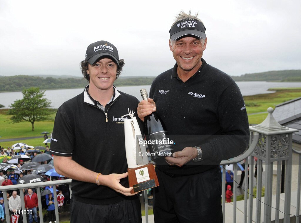 21 July 2010; Golfers Rory McIlroy, left, and Darren Clarke celebrate with the trophy after winning the 2010 Lough Erne Challenge. Lough Erne Resort, Enniskillen, Co. Fermanagh. Picture credit: Oliver McVeigh / SPORTSFILE