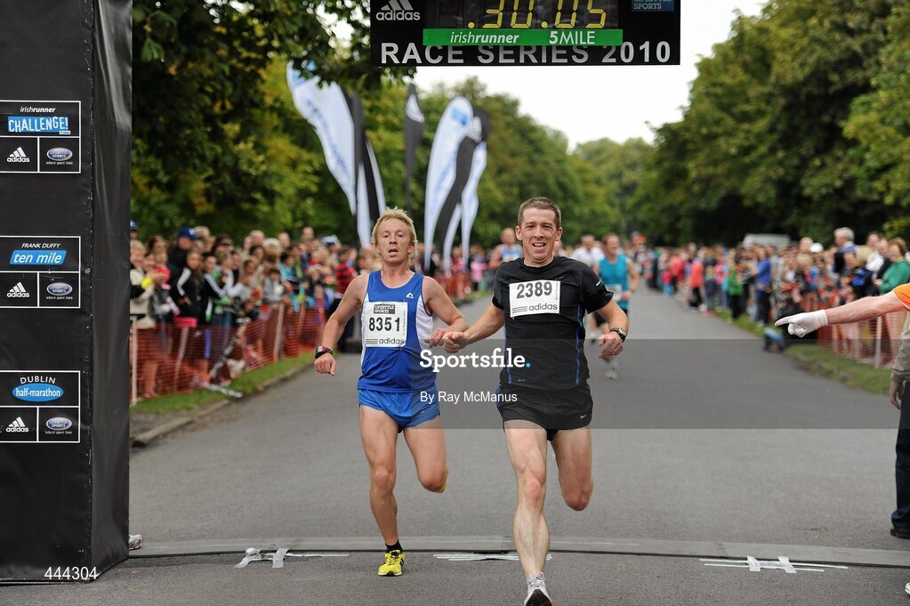 17 July 2010; James Nealon, 2389, from leixlip, Co. Kildare, beats Hugh McKenzie Vass, 8351 Gneeveguilla, Co. Kerry, on the finish line during the Lifestyle Sports - adidas Irish Runner 5 Mile Race. The Phoenix Park, Dublin. Picture credit: Ray McManus / SPORTSFILE