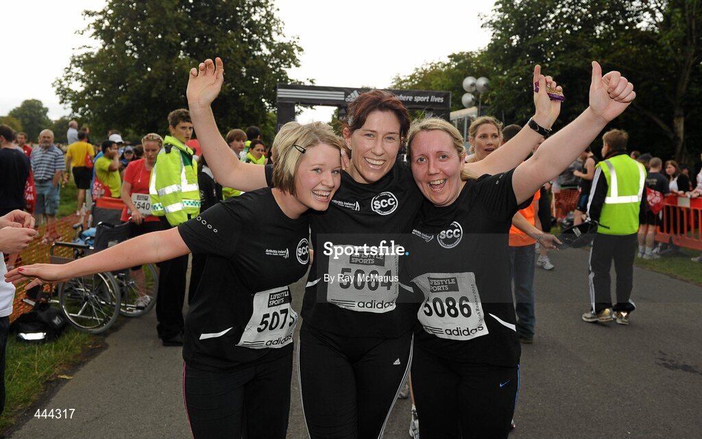 17 July 2010; Lorraine Thompson, 5075, Jeanette Price, 5064, and Lynn McCarthy, 5086, after completing the Lifestyle Sports - adidas Irish Runner 5 Mile Race. The Phoenix Park, Dublin. Picture credit: Ray McManus / SPORTSFILE