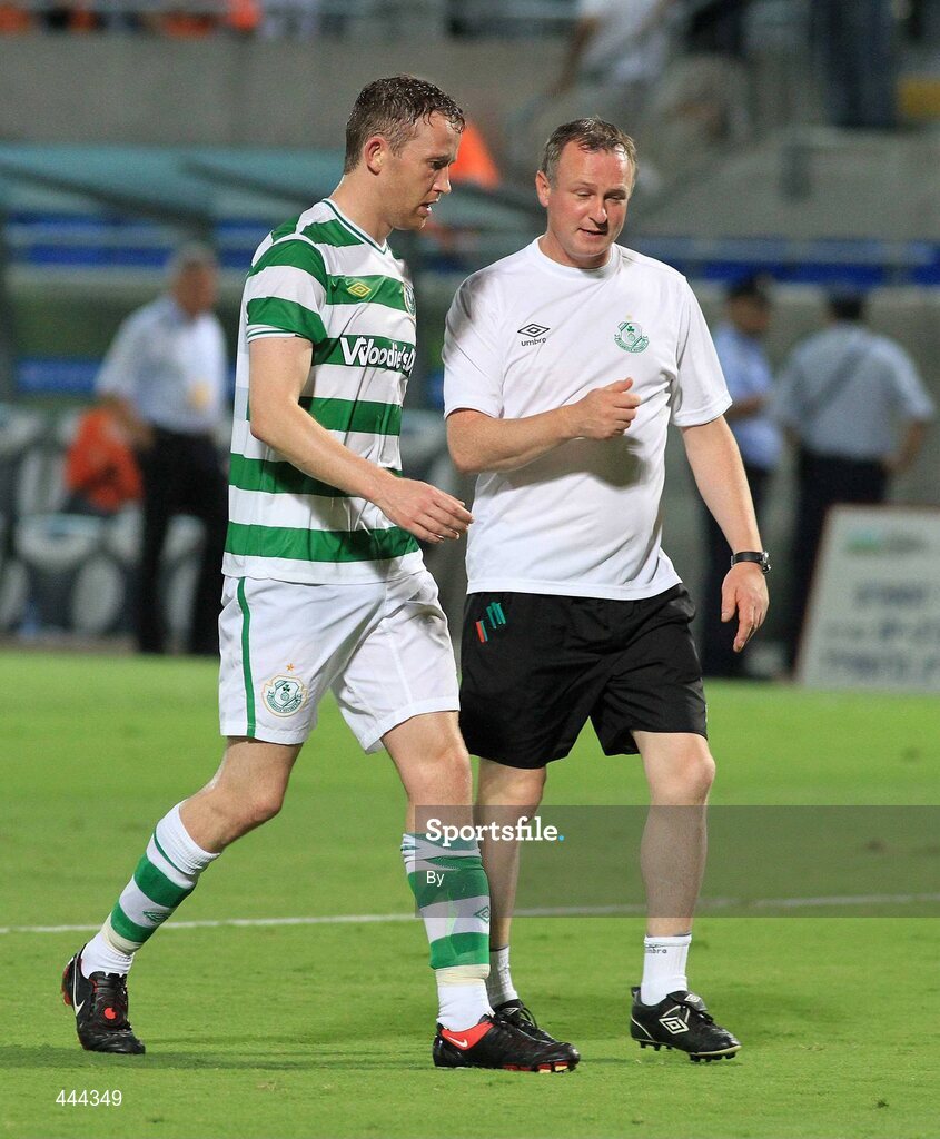 22 July 2010; Shamrock Rovers manager Michael O'Neill speaks with his player Aidan Price. UEFA Europa League Second Qualifying Round, 2nd Leg, Bnei Yehuda Tel-Aviv FC v Shamrock Rovers, Bloomfield Stadium, Tel Aviv, Israel. Picture credit: SPORTSFILE