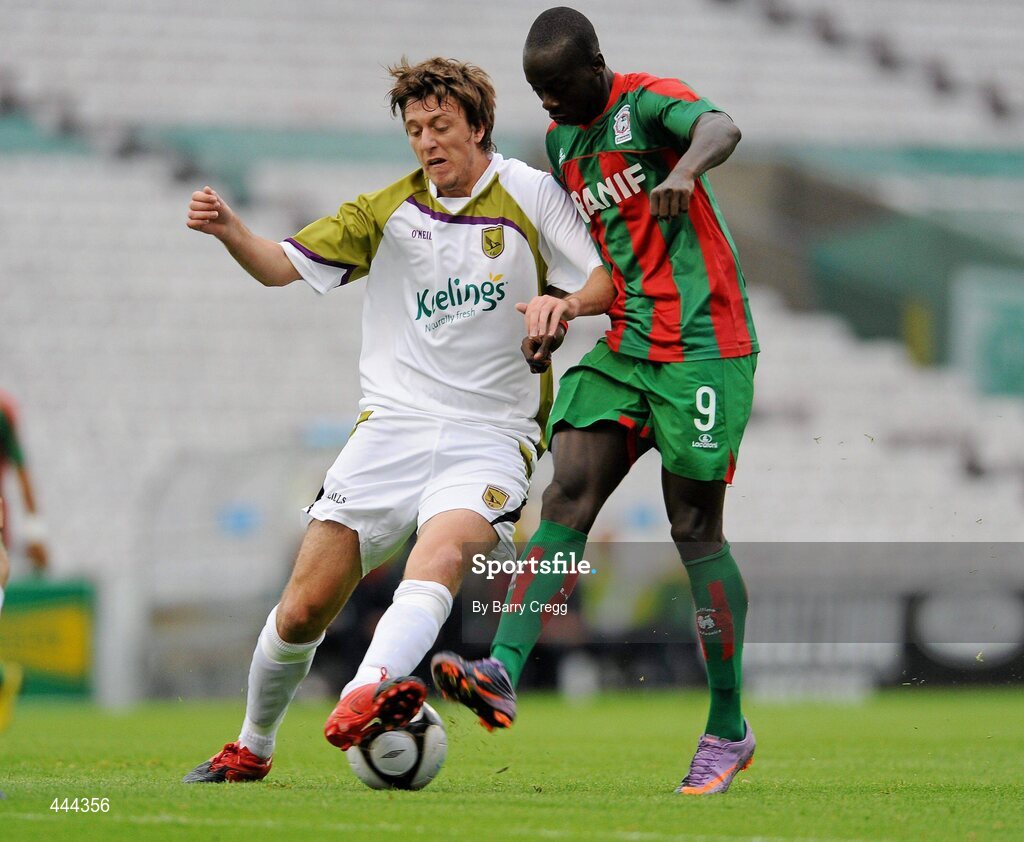 22 July 2010; Shane Mvfaul, Sporting Fingal, intercepts  Papa Babacar Diawara, CS Marítimo. UEFA Europa League Second Qualifying Round, 2nd Leg, Sporting Fingal v CS Marítimo, Dalymount Park, Dublin. Picture credit: Barry Cregg / SPORTSFILE
