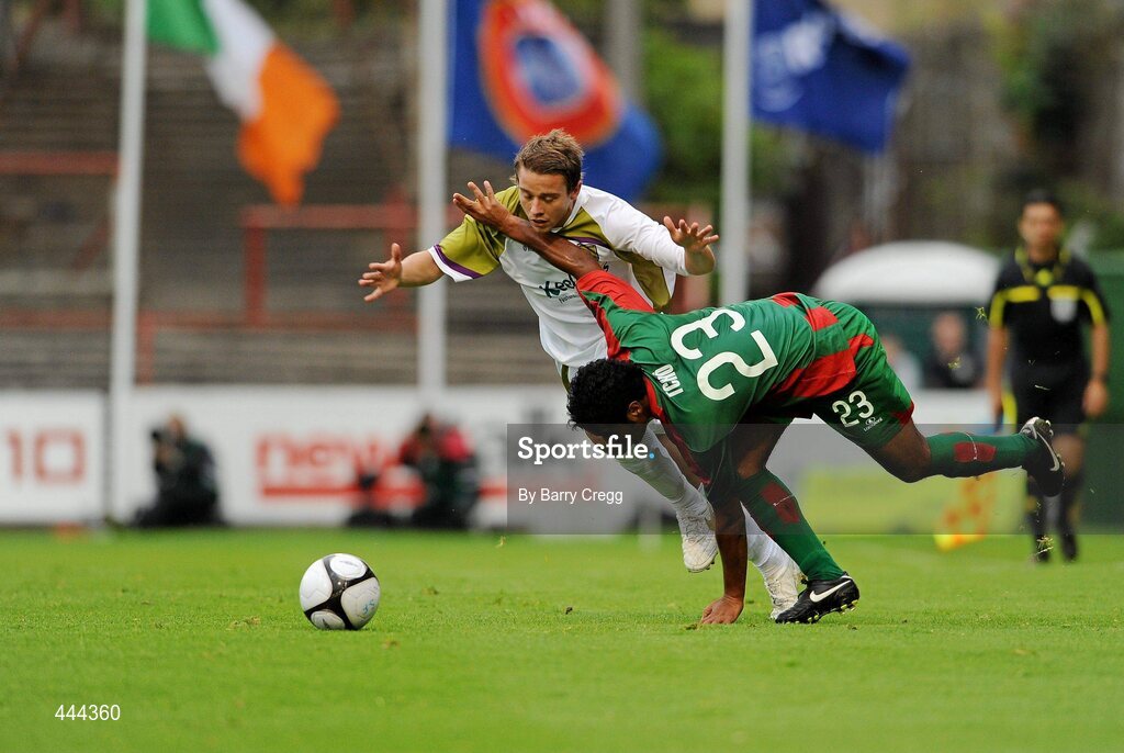 22 July 2010; Valdecir Souza Junior, CS Marítimo, tries to stop Ger O'Brien, Sporting Fingal, from getting to the ball. UEFA Europa League Second Qualifying Round, 2nd Leg, Sporting Fingal v CS Marítimo, Dalymount Park, Dublin. Picture credit: Barry Cregg / SPORTSFILE