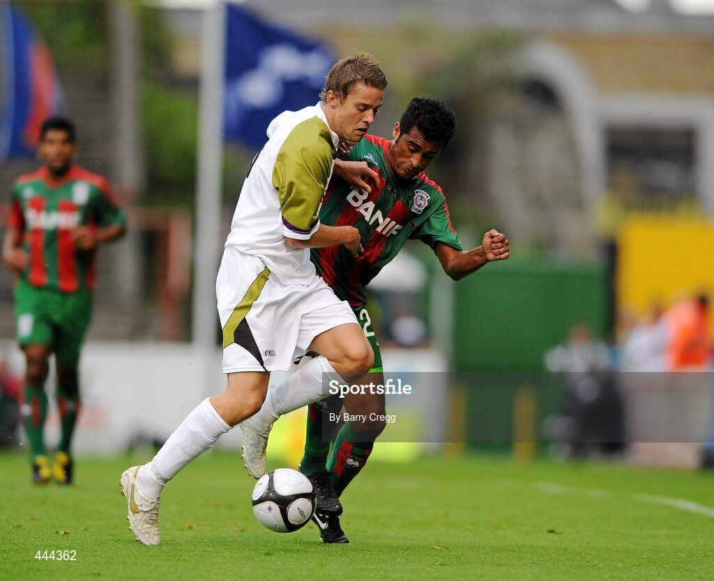 22 July 2010; Ger O'Brien, Sporting Fingal, in action against Valdecir Souza Junior, CS Marítimo. UEFA Europa League Second Qualifying Round, 2nd Leg, Sporting Fingal v CS Marítimo, Dalymount Park, Dublin. Picture credit: Barry Cregg / SPORTSFILE