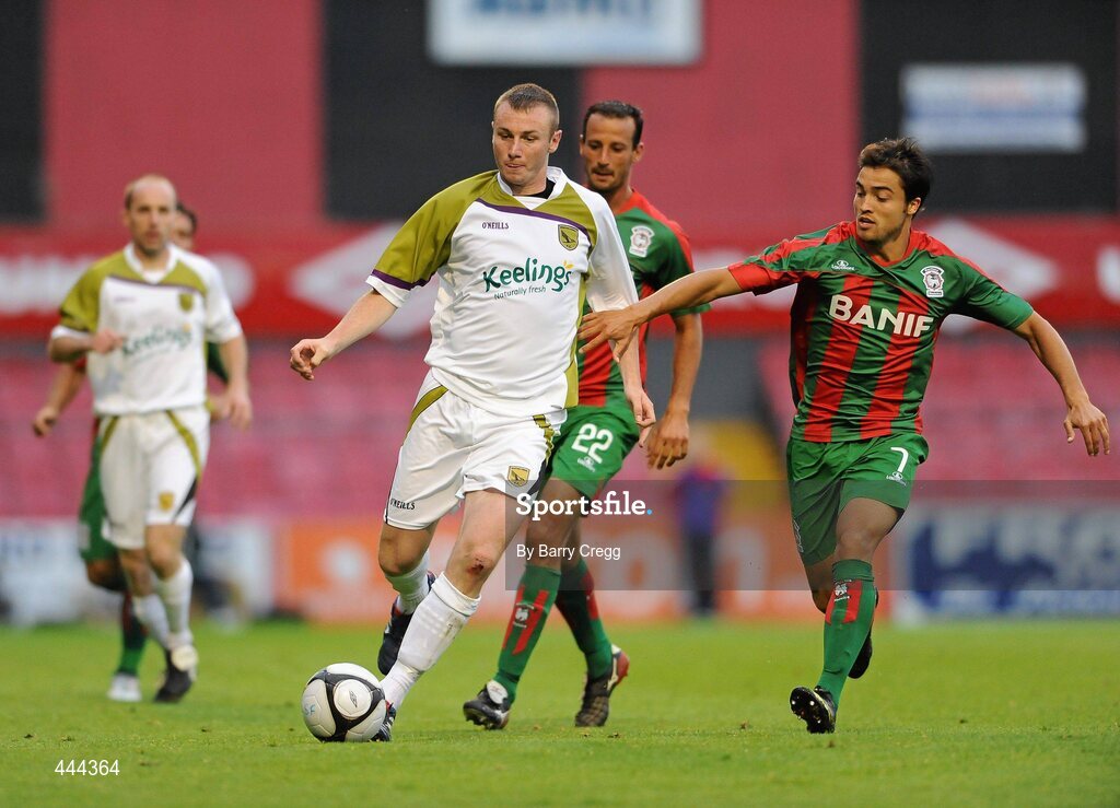 22 July 2010; Kenny Browne, Sporting Fingal, in action against Abdelmalek Cherread, left, and Marco Aurelio Iubel, CS Marítimo. UEFA Europa League Second Qualifying Round, 2nd Leg, Sporting Fingal v CS Marítimo, Dalymount Park, Dublin. Picture credit: Barry Cregg / SPORTSFILE