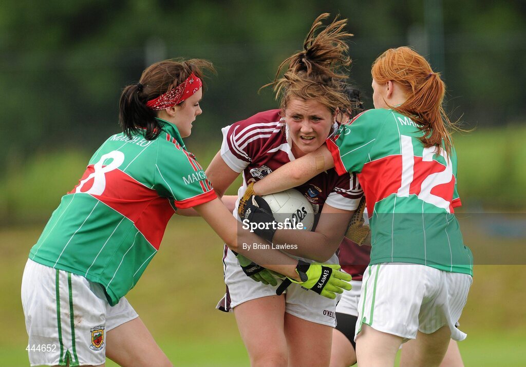 24 July 2010; Aoife O'Brien, Westmeath, in action against Clodagh McManamon, left, and Tracey Hall, Mayo. Ladies Gaelic Football Minor A Shield All-Ireland Final, Mayo v Westmeath, Seán O'Heslin GAA Cub, Ballinamore, Co. Leitrim. Picture credit: Brian Lawless / SPORTSFILE