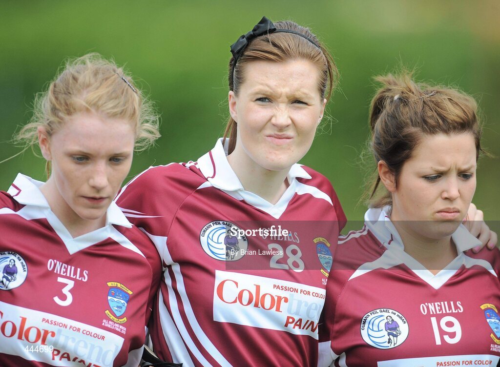24 July 2010; Westmeath players, from left, Aoife Brady, captain, Ruth Daniels, and Jill Draper, show their disappointment after the match. Ladies Gaelic Football Minor A Shield All-Ireland Final, Mayo v Westmeath, Seán O'Heslin GAA Cub, Ballinamore, Co. Leitrim. Picture credit: Brian Lawless / SPORTSFILE