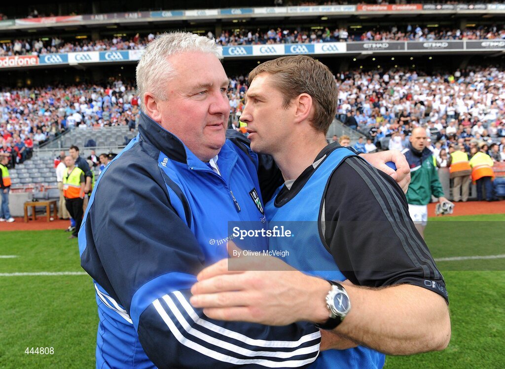 24 July 2010; Kildare manager Kieran McGeeney, right, hugs Monaghan assistant manager Paul Grimley at the final whistle. GAA Football All-Ireland Senior Championship Qualifier, Round 4, Monaghan v Kildare, Croke Park, Dublin. Picture credit: Oliver McVeigh / SPORTSFILE