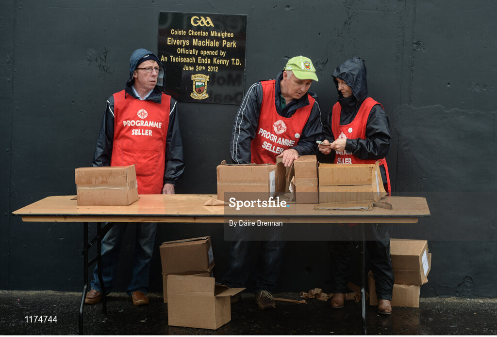 18 June 2016; Programme sellers,  from left to right, John Faulkner, Noel Browne, and Marion Faulkner, all from Castlebar, Co. Mayo, wait for customers prior to the Connacht GAA Football Senior Championship Semi-Final match between Mayo and Galway at Elverys MacHale Park in Castlebar, Co Mayo. Photo by Daire Brennan/Sportsfile