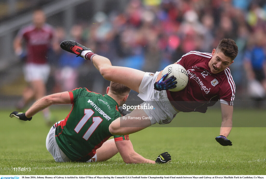 18 June 2016; Johnny Heaney of Galway is tackled by Aidan O’Shea of Mayo during the Connacht GAA Football Senior Championship Semi-Final match between Mayo and Galway at Elverys MacHale Park in Castlebar, Co Mayo. Photo by Ramsey Cardy/Sportsfile