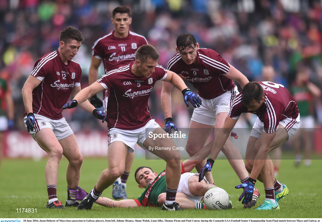 18 June 2016; Jason Doherty of Mayo loses possession to Galway players, from left, Johnny Heaney, Shane Walsh, Liam Silke, Thomas Flynn and Paul Conroy during the Connacht GAA Football Senior Championship Semi-Final match between Mayo and Galway at Elverys MacHale Park in Castlebar, Co Mayo. Photo by Ramsey Cardy/Sportsfile