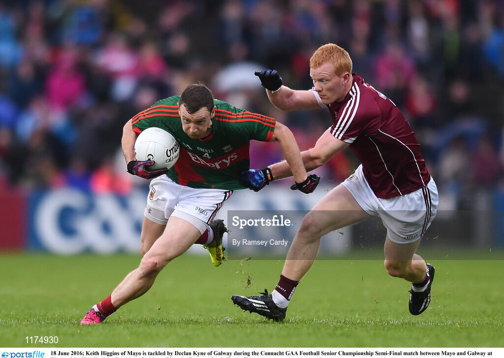 18 June 2016; Keith Higgins of Mayo is tackled by Declan Kyne of Galway during the Connacht GAA Football Senior Championship Semi-Final match between Mayo and Galway at Elverys MacHale Park in Castlebar, Co Mayo. Photo by Ramsey Cardy/Sportsfile