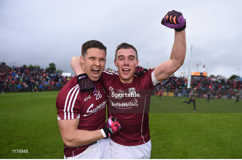18 June 2016; Galway's Sean Denvir, left, and Eamonn Brannigan celebrate following their side's victory in the Connacht GAA Football Senior Championship Semi-Final match between Mayo and Galway at Elverys MacHale Park in Castlebar, Co Mayo. Photo by Ramsey Cardy/Sportsfile