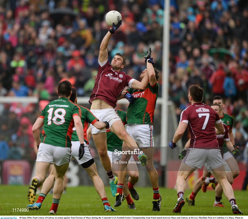 18 June 2016; Paul Conroy of Galway in action against Tom Parsons of Mayo during the Connacht GAA Football Senior Championship Semi-Final match between Mayo and Galway at Elverys MacHale Park in Castlebar, Co Mayo. Photo by Daire Brennan/Sportsfile