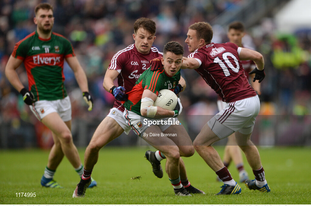 18 June 2016; Evan Regan of Mayo in action against Eoghan Kerin, left, and Gary Sice of Galway during the Connacht GAA Football Senior Championship Semi-Final match between Mayo and Galway at Elverys MacHale Park in Castlebar, Co Mayo. Photo by Daire Brennan/Sportsfile