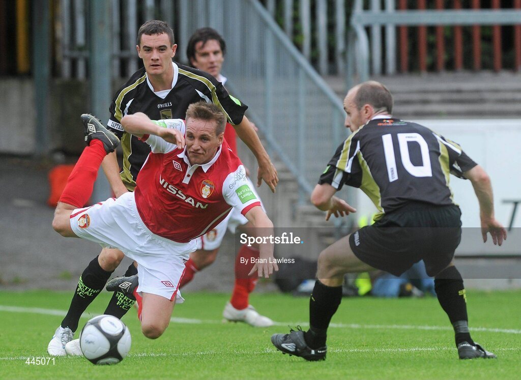 25 July 2010; Gareth O'Connor, St Patrick's Athletic, in action against Shaun Williams, left, and Alan Kirby, Sporting Fingal. Airtricity League Premier Division, St Patrick's Athletic v Sporting Fingal, Richmond Park, Dublin. Picture credit: Brian Lawless / SPORTSFILE