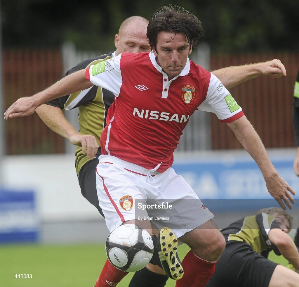 25 July 2010; Stuart Byrne, St Patrick's Athletic, in action against Glen Crowe, Sporting Fingal. Airtricity League Premier Division, St Patrick's Athletic v Sporting Fingal, Richmond Park, Dublin. Picture credit: Brian Lawless / SPORTSFILE