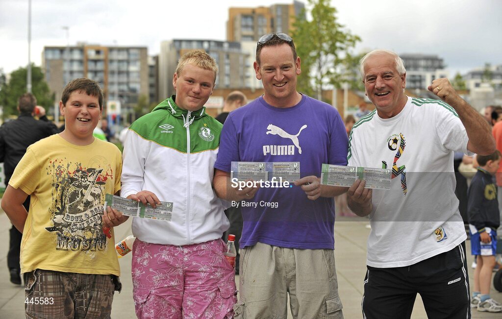 26 July 2010; Shamrock Rovers fans, from left, John Griffin,13, Callum Griffin,13, Kevin Cooper and John Mahon, celebrate after recieving their tickets in advance of their side's Europa League Third Qualifying Round, 1st Leg, game against Juventus on Thursday night. Tallaght Stadium, Tallaght, Dublin. Picture credit: Barry Cregg / SPORTSFILE