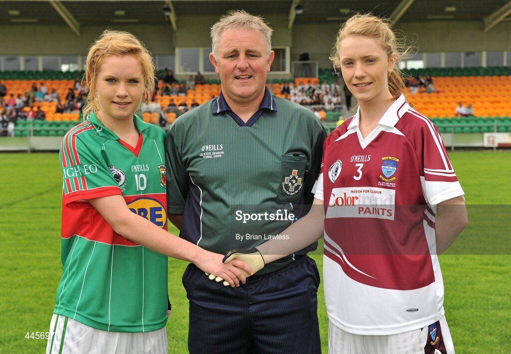 24 July 2010; Mayo captain Carol Hegarty, left, and Westmeath captain Aoife Brady, shake hands in the company of referee Terence McShea. Ladies Gaelic Football Minor A Shield All-Ireland Final, Mayo v Westmeath, Seán O'Heslin GAA Cub, Ballinamore, Co. Leitrim. Picture credit: Brian Lawless / SPORTSFILE