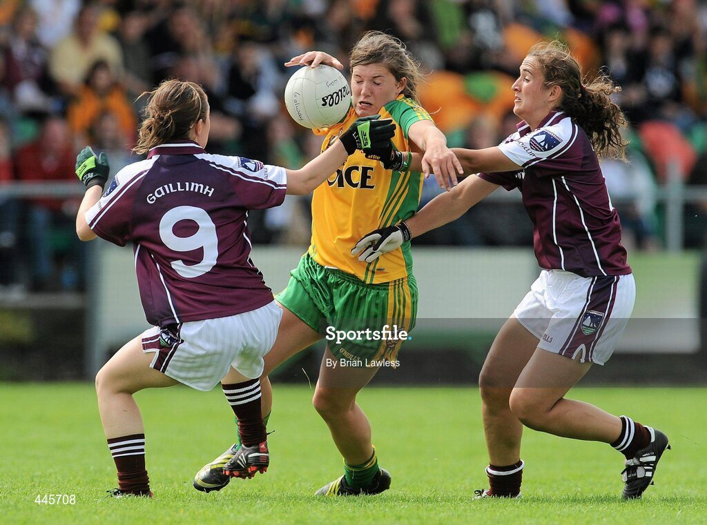 24 July 2010; Ciara Hegarty, Donegal, in action against Maria Connell, left, and Dora Gorman, Galway. Ladies Gaelic Football Minor A Championship All-Ireland Final, Donegal v Galway, Seán O'Heslin GAA Cub, Ballinamore, Co. Leitrim. Picture credit: Brian Lawless / SPORTSFILE