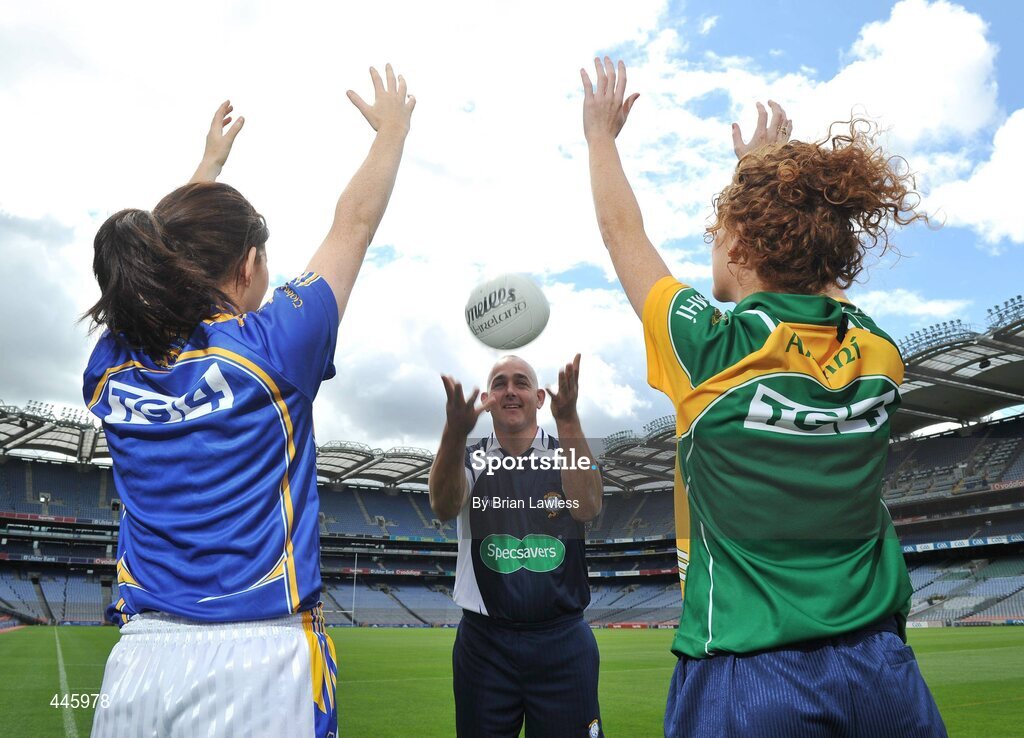 28 July 2010; A new sponsorship deal between Specsavers and the Ladies Gaelic Football Association will ensure all of the sport's national All Ireland panel of referees have their eyes firmly focussed on the game. At the announcement is ladies football referee Eugene O'Hare with ladies senior footballers Mairead Morrissey, Tipperary, and Eve Wardick, Meath. Croke Park, Dublin. Picture credit: Brian Lawless / SPORTSFILE