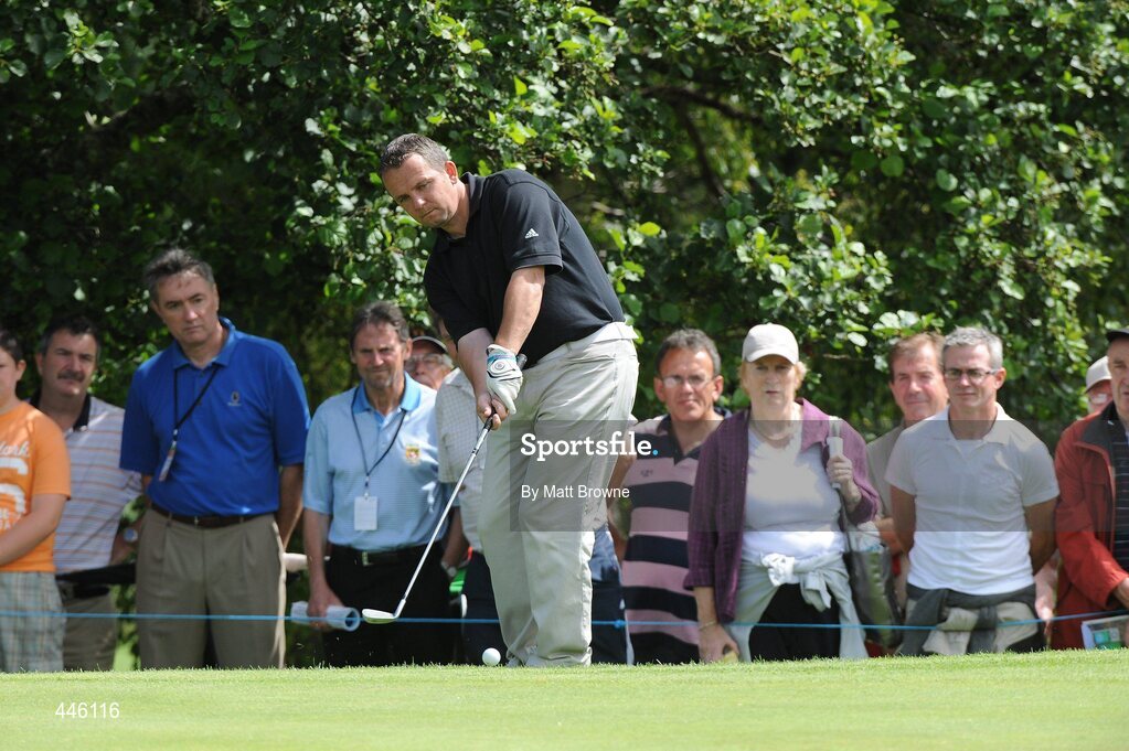 28 July 2010; Waterford hurling manager Davy Fitzgerald pitches onto the 5th green. 3 Irish Open Golf Championship - Pro Am, Killeen Course, Killarney Golf & Fishing Club, Killarney, Co. Kerry. Picture credit: Matt Browne / SPORTSFILE