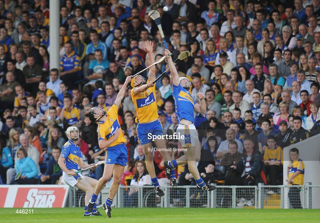 28 July 2010; Seamus Hennessy and Brendan Maher, left, Tipperary, in action against John Conlon and Liam Markham, left, Clare. Bord Gáis Energy GAA Hurling Under 21 Munster Championship Final, Tipperary v Clare, Semple Stadium, Thurles, Co. Tipperary. Picture credit: Diarmuid Greene / SPORTSFILE