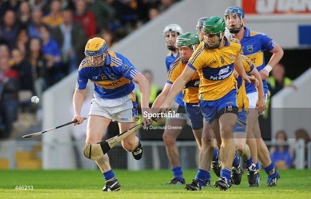 28 July 2010; Sean Carey, Tipperary, in action against Camin Morey, Clare. Bord Gáis Energy GAA Hurling Under 21 Munster Championship Final, Tipperary v Clare, Semple Stadium, Thurles, Co. Tipperary. Picture credit: Diarmuid Greene / SPORTSFILE