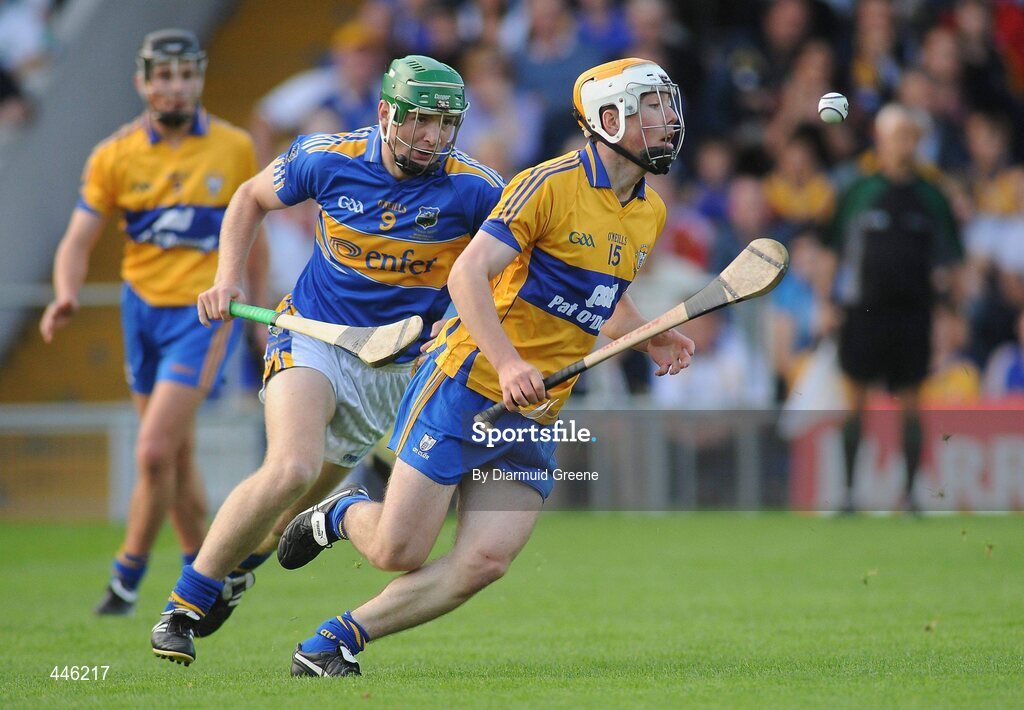 28 July 2010; Conor McGrath, Clare, in action against Noel McGrath, Tipperary. Bord Gáis Energy GAA Hurling Under 21 Munster Championship Final, Tipperary v Clare, Semple Stadium, Thurles, Co. Tipperary. Picture credit: Diarmuid Greene / SPORTSFILE