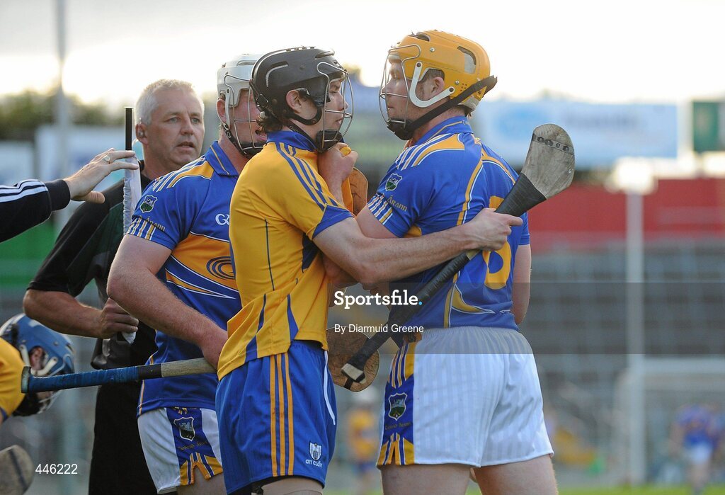 28 July 2010; Fergus Kennedy, Clare, and Padraic Maher, Tipperary, tussle off the ball. Bord Gáis Energy GAA Hurling Under 21 Munster Championship Final, Tipperary v Clare, Semple Stadium, Thurles, Co. Tipperary. Picture credit: Diarmuid Greene / SPORTSFILE