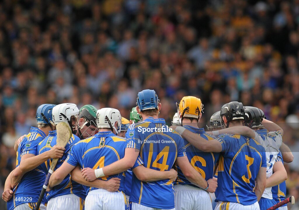 28 July 2010; The Tipperary team gather together in a huddle before the game. Bord Gáis Energy GAA Hurling Under 21 Munster Championship Final, Tipperary v Clare, Semple Stadium, Thurles, Co. Tipperary. Picture credit: Diarmuid Greene / SPORTSFILE