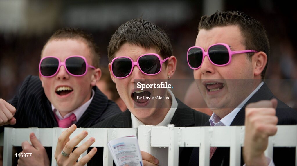 29 July 2010; Cathal Birrane, left, Raymond Higgins and Karl Walsh, from Ballina, Co. Mayo, cheer on their selections during the The Guinness Time Handicap. Galway Racing Festival 2010, Ballybrit, Galway. Picture credit: Ray McManus / SPORTSFILE