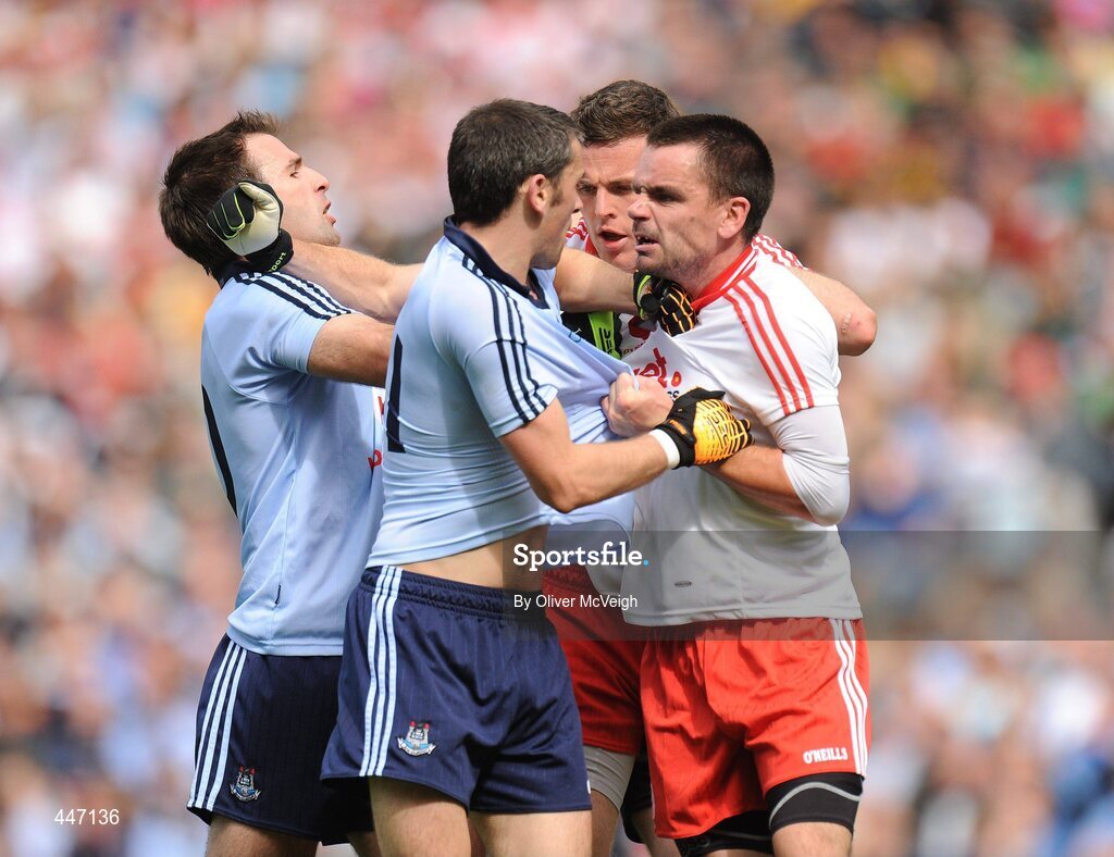 31 July 2010; Bryan Cullen and Alan Brogan, Dublin, get involved in an altercation with Conor Gormley and Ryan McMenamin, Tyrone, during the game. GAA Football All-Ireland Senior Championship Quarter-Final, Tyrone v Dublin, Croke Park, Dublin. Picture credit: Oliver McVeigh / SPORTSFILE