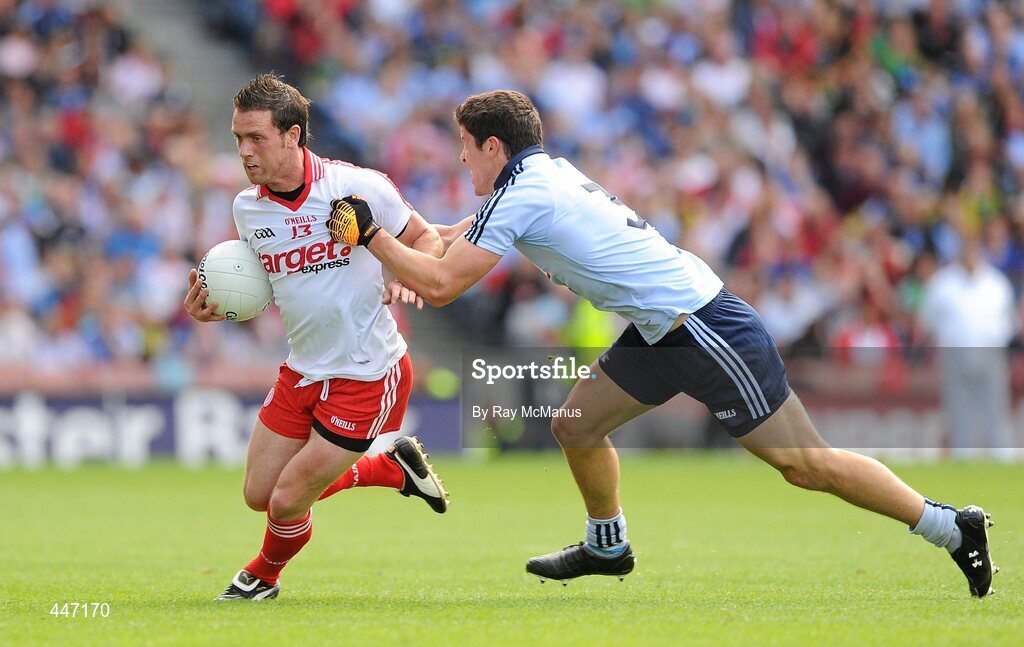 31 July 2010; Martin Penrose, Tyrone, in action against Rory O'Carroll, Dublin. GAA Football All-Ireland Senior Championship Quarter-Final, Tyrone v Dublin, Croke Park, Dublin. Picture credit: Ray McManus / SPORTSFILE