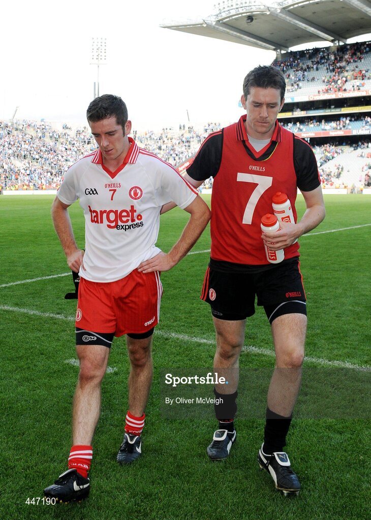 31 July 2010; A dejected Philip Jordan and John Devine, Tyrone, leave the pitch after the game. GAA Football All-Ireland Senior Championship Quarter-Final, Tyrone v Dublin, Croke Park, Dublin. Picture credit: Oliver McVeigh / SPORTSFILE