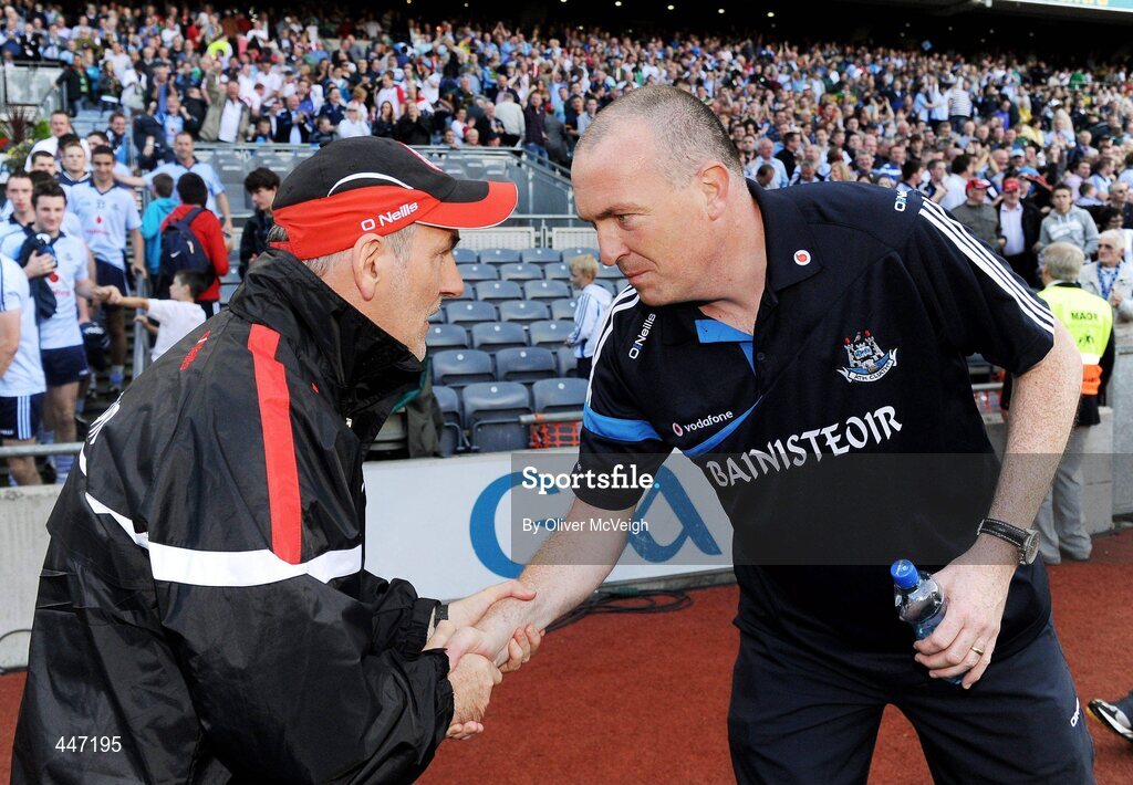 31 July 2010; Dublin manager Pat Gilroy, right, is congratulated by Tyrone manager Mickey Harte at the final whistle. GAA Football All-Ireland Senior Championship Quarter-Final, Tyrone v Dublin, Croke Park, Dublin. Picture credit: Oliver McVeigh / SPORTSFILE
