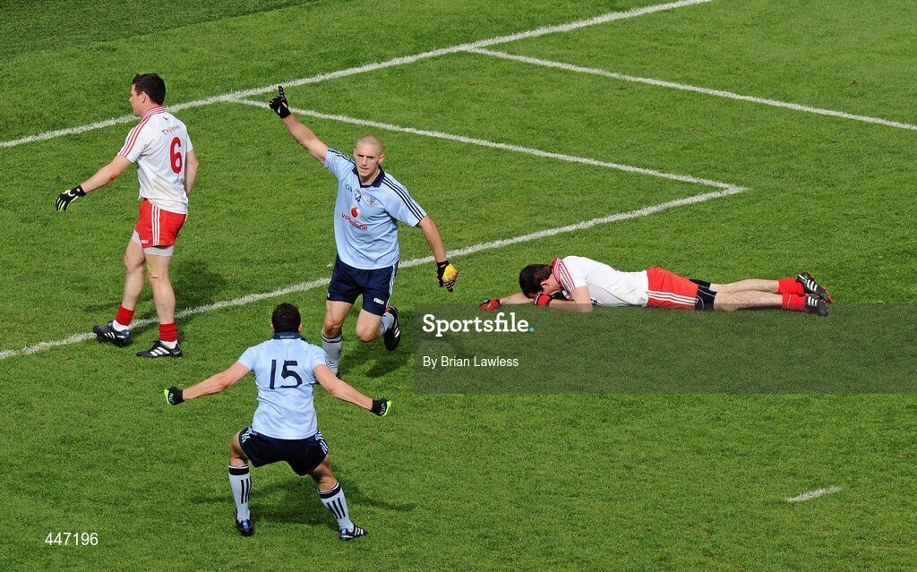 31 July 2010; Eoghan O'Gara, Dublin, celebrates with team-mate Bernard Brogan after scoring his side's first goal as Tyrone's Justin McMahon and Conor Gormley, left, react. GAA Football All-Ireland Senior Championship Quarter-Final, Tyrone v Dublin, Croke Park, Dublin. Picture credit: Brian Lawless / SPORTSFILE
