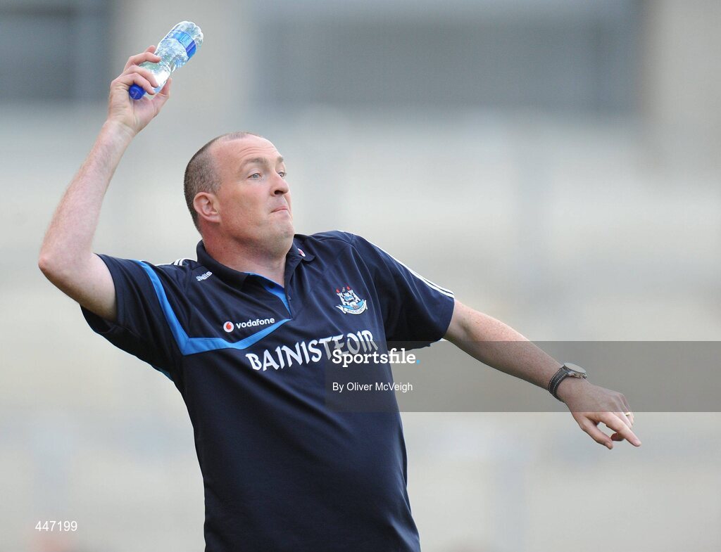31 July 2010; Dublin manager Pat Gilroy throws a water bottle on to one of his players in the closing minutes. GAA Football All-Ireland Senior Championship Quarter-Final, Tyrone v Dublin, Croke Park, Dublin. Picture credit: Oliver McVeigh / SPORTSFILE
