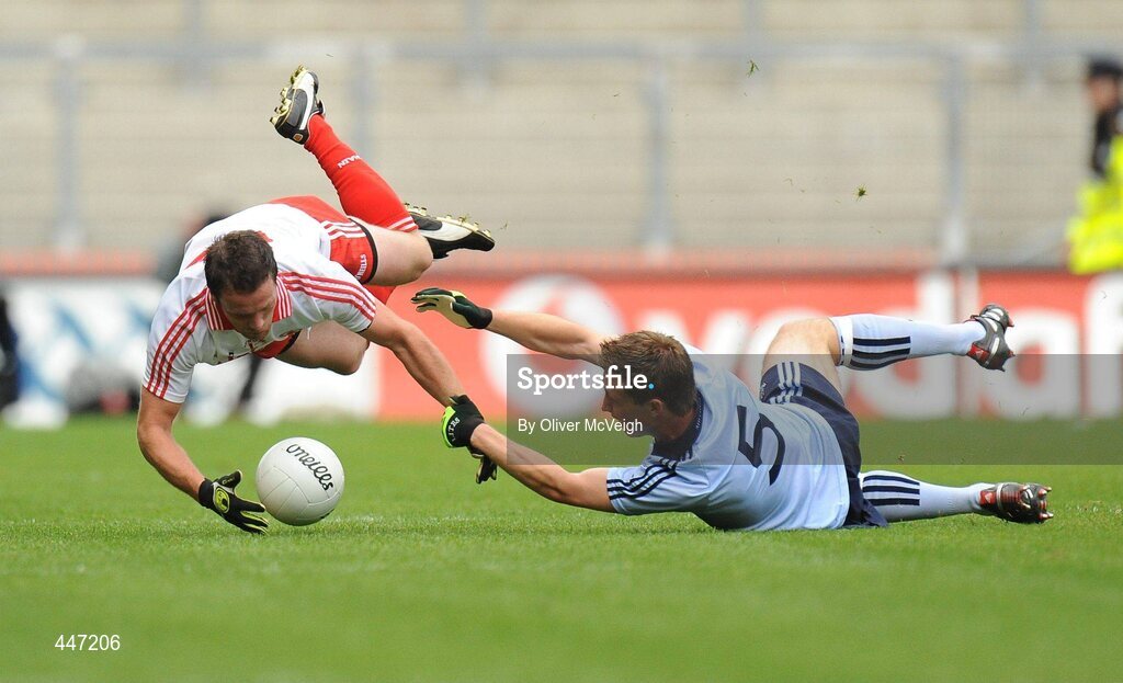 31 July 2010; Martin Penrose, Tyrone, in action against Kevin Nolan, Dublin. GAA Football All-Ireland Senior Championship Quarter-Final, Tyrone v Dublin, Croke Park, Dublin. Picture credit: Oliver McVeigh / SPORTSFILE